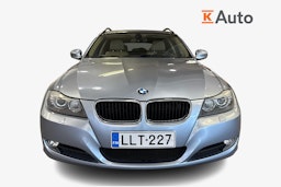 sininen BMW 320 2010 kuva 4.