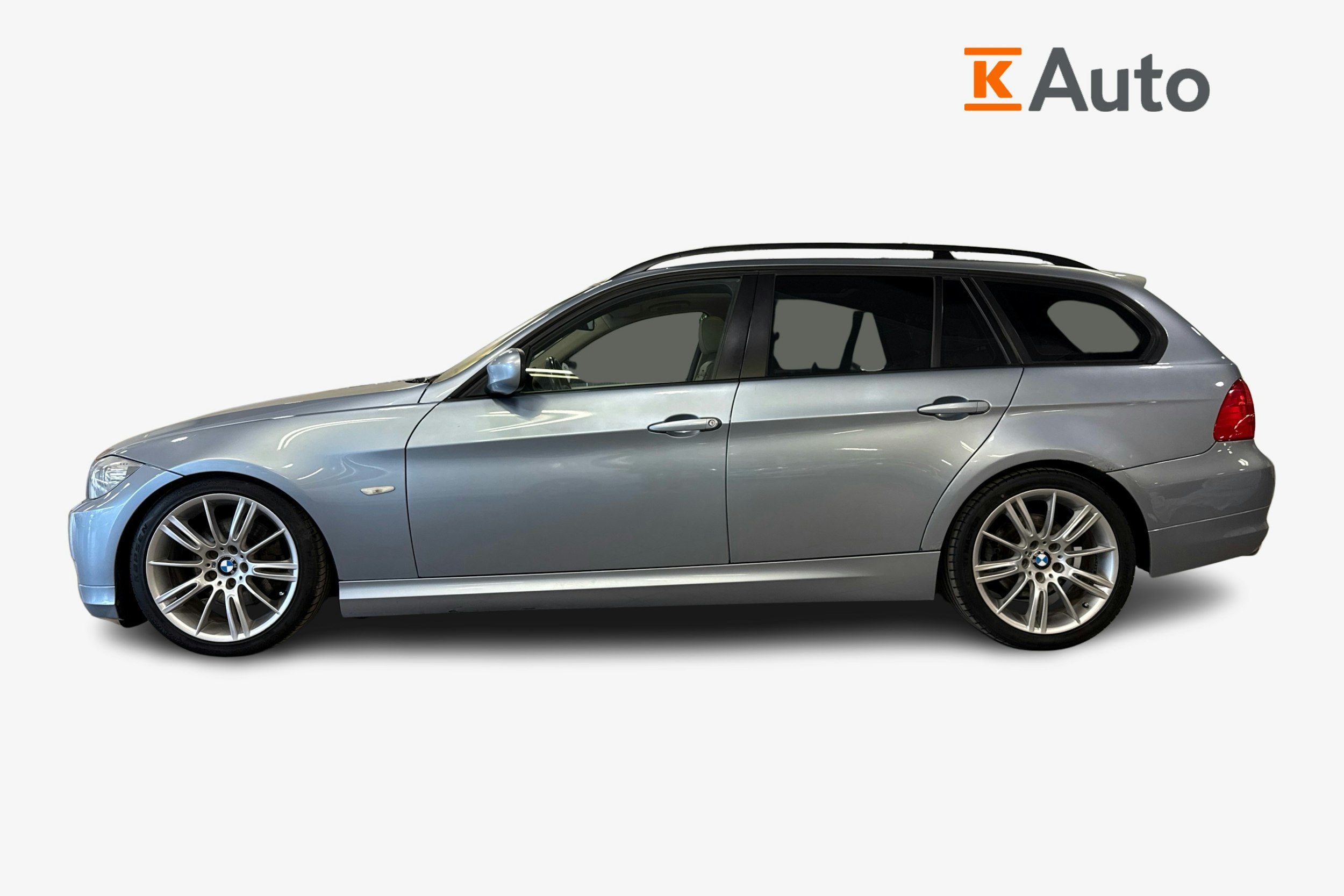 sininen BMW 320 2010 kuva 5.