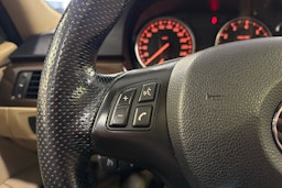 sininen BMW 320 2010 kuva 14.