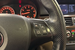 sininen BMW 320 2010 kuva 15.