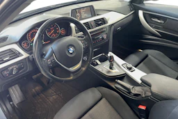 Sininen BMW 320 2013 kuva 8.