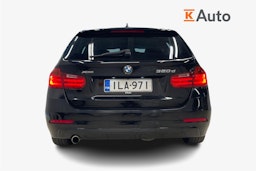 Musta BMW 320 2013 kuva 3.