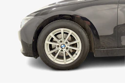 musta BMW 320 2013 kuva 12.