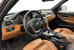musta BMW 320 2013 kuva 3.