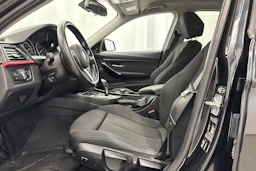 musta BMW 320 2015 kuva 18.