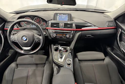 musta BMW 320 2014 kuva 12.