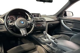 musta BMW 320 2015 kuva 7.