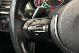 musta BMW 320 2015 kuva 16.