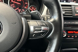 musta BMW 320 2015 kuva 17.
