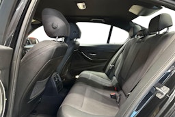musta BMW 320 2017 kuva 10.
