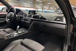 musta BMW 320 2017 kuva 14.