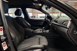 musta BMW 320 2017 kuva 15.