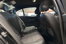 musta BMW 320 2017 kuva 16.
