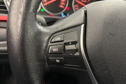 musta BMW 320 2016 kuva 15.