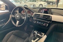 valkoinen BMW 320 2017 kuva 16.