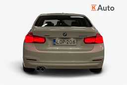 valkoinen BMW 320 2018 kuva 4.