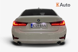 Valkoinen BMW 320 2021 kuva 3.