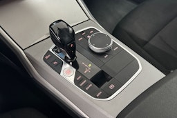 Valkoinen BMW 320 2021 kuva 17.