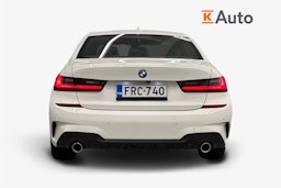valkoinen BMW 320 2021 kuva 3.
