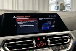 sininen BMW 320 2021 kuva 14.