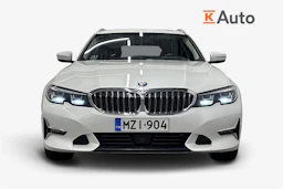 valkoinen BMW 320 2021 kuva 4.