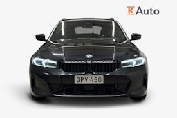 Musta BMW 320 2022 kuva 5.