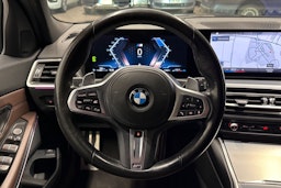 Musta BMW 320 2022 kuva 14.