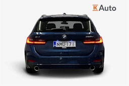 sininen BMW 320 2022 kuva 3.