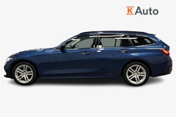 sininen BMW 320 2023 kuva 6.