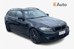 musta BMW 330 2009 kuva 1.