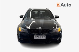 musta BMW 330 2009 kuva 5.