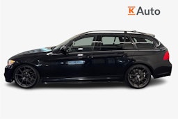 musta BMW 330 2009 kuva 6.