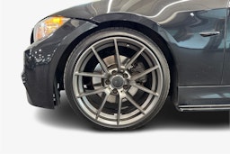 musta BMW 330 2009 kuva 11.