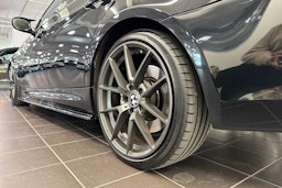 musta BMW 330 2009 kuva 13.