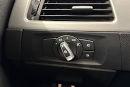 musta BMW 330 2009 kuva 21.