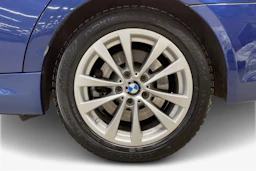 Sininen BMW 330 2010 kuva 9.