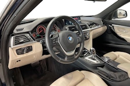 sininen BMW 330 2016 kuva 7.