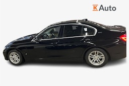 Musta BMW 330 2017 kuva 6.