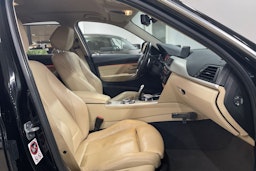 Musta BMW 330 2017 kuva 14.