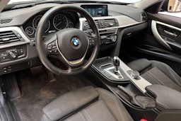 harmaa BMW 330 2017 kuva 7.