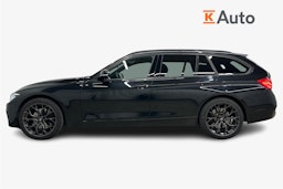 musta BMW 330 2017 kuva 6.