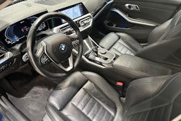 Sininen BMW 330 2020 kuva 7.