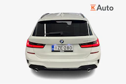 Valkoinen BMW 330 2021 kuva 3.