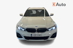 Valkoinen BMW 330 2021 kuva 4.