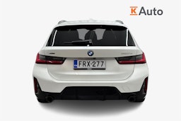 valkoinen BMW 330 2023 kuva 3.