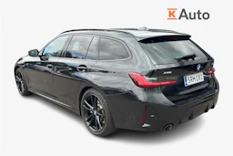 Musta BMW 330 2024 kuva 2.