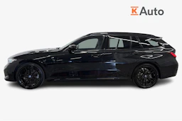 Musta BMW 330 2024 kuva 5.