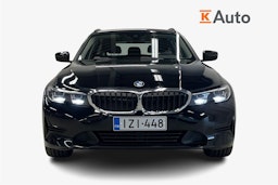 Musta BMW 330e 2021 kuva 5.