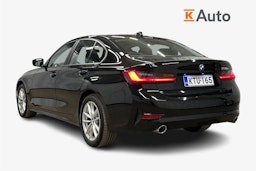 Musta BMW 330e 2021 kuva 2.