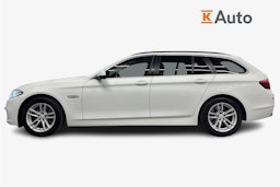 valkoinen BMW 518 2015 kuva 6.